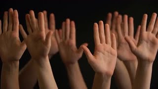 Raising Hands Stock Video