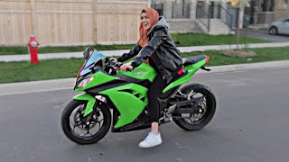 HIJABI GIRL RIDES A MOTORCYCLE