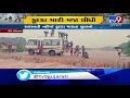 gujarat rains youths seen dangerously jumping into flowing saraswati river gir somnath tv9