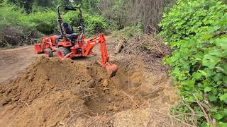 Home dirtbike track update, clearing land with Kubota BX23s.