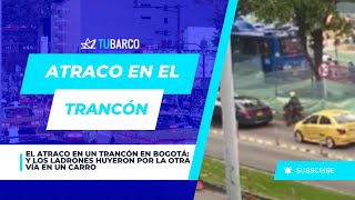 El atraco en un trancón en Bogotá: y los ladrones huyeron por la otra vía en un carro