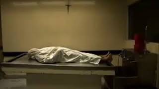 A woman having sex with Dead bodies in mortuary