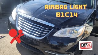 2014 Chrysler 200 air bag light on code B1C14