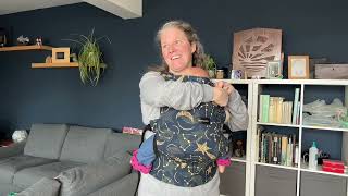 How to use the Momcozy Baby Carrier, in the hip/side carry position.