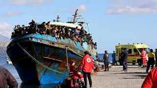 Boat carrying hundreds of migrants docks after Greek rescue | AFP