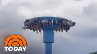 Amusement park riders stuck upside down for nearly 30 minutes