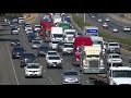 truckers coordinate rolling protest slowing traffic on highway 99