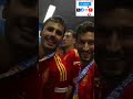 spain s alvaro morata celebrates with teammates after winning the euro 2024 final football shorts