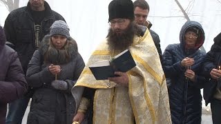 Father buries 4-year-old son, curses Ukraine's war