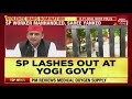 sp leader accuses bjp workers of pulling woman s saree akhilesh yadav attacks cm