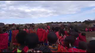 SEE THE MAASAI WOMEN SINGING TRADITIONAL SONG IN THE MANYATTA.