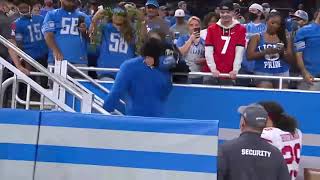 Lions rookie Penei Sewell runs to family for a warm embrace after NFL debut