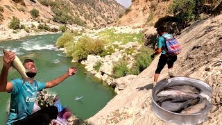 Fantastic Atabek fishing from the roaring river: family happiness