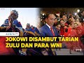 Momen Presiden Jokowi Tiba di Afrika Selatan Disambut Tarian Zulu dan Para WNI