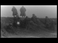 aef soldiers digging new trenches in a field in france respond to gas attack. hd stock footage