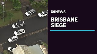 Man with a weapon inside Sunnybank home as siege in Brisbane's south continues | ABC News