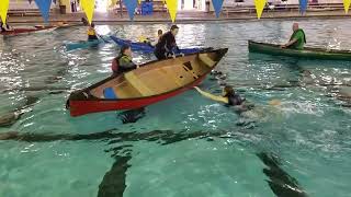 Getting into a canoe from deep water