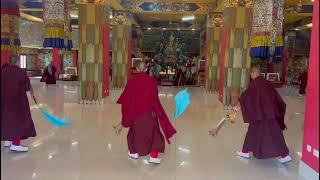 Monks rehearsing the secret ritual dance of Tsacham at Mindrolling Monastery, India.