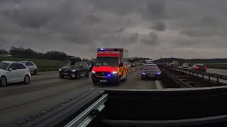 Airport Ambulance taking emergency corridor through highway traffic jam