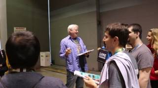 E3 2016 - Charles Martinet giving out autographed photos at the end of the Zelda Line.