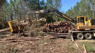 Tigercat 234B and John Deere 748L