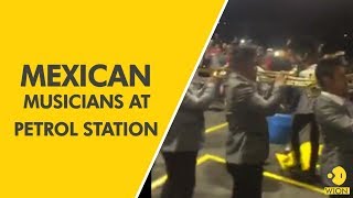 Mexican musicians play at petrol station amidst fuel shortages