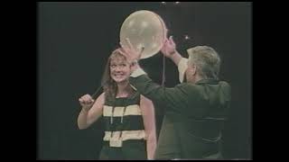 Bob Higa threading a Needle Through Balloon +1-202-369-1063