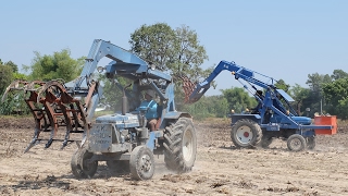 รถคีบอ้อย 2 คัน คีบอ้อยใส่รถบรรทุกสิบล้อ TRACTOR   FORD  NEW HOLLAND,