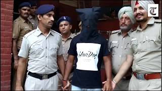 Sector 40 murder suspect Rajat Tiwari in police custody in Chandigarh on Wednesday.