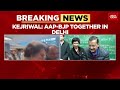 delhi election 2025 arvind kejriwal hits out at congress slams gehlot health scheme announcement