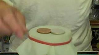 Mike Danata Demonstrates The Coin Through Rubber Sheet Trick