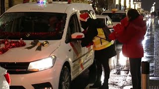 Madrid’s taxi drivers provide a special Christmas journey for the elderly