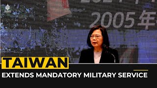 Taiwan extends military service as China dials up pressure