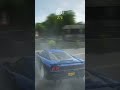 Saleen s7 doing donuts and burnouts in a parking lot.