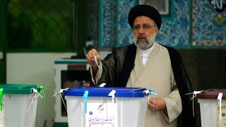 Ultraconservative cleric Ebrahim Raisi casts his ballot | AFP
