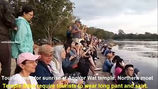 Tourists wait for sunrise at Angkor Wat temple, Dress Code at temple sites