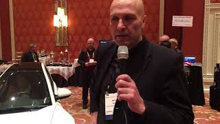 Jerry Kroll, the CEO of Electra Meccanica shows off their Solo