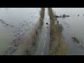 Attempting to cross the flooded Ouse Wash causeway, Welney