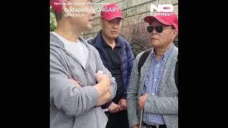 Hungarian parliament member stopped by Chinese individuals for carrying EU flag