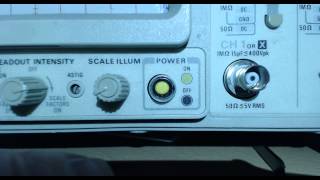 Tektronix 2445A power button: mechanical indication of power status