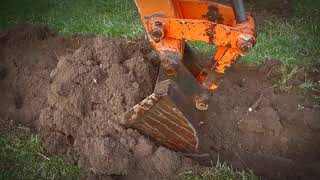 Retaining Wall Base and Block Leveling Techniques Segment 1