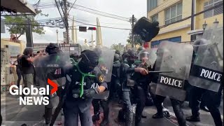 Thailand police fire rubber bullets, tear gas to disperse protesters outside APEC summit