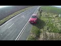 dji f450 quadcopter naza fpv flying chasing cars and flying high