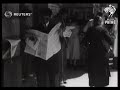 ITALY: PEOPLE BUYING NEWSPAPERS FROM BOOKSTALL IN ROME STREETS (1937)