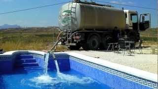 MAN tanker truck filling the pool