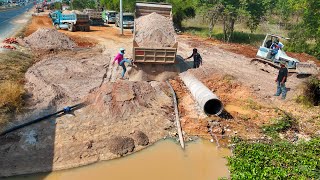 Outstanding Operator Dump Truck and Bulldozer Push Soil and Clearing Land Next to the highway