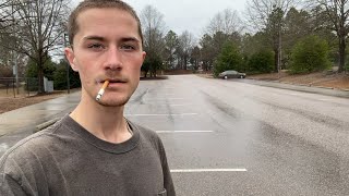 Smoking a Cigarette in the Rain