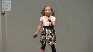 Darling 7-year-old girl sings solo \