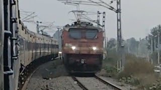 DDU WAP4 leading some LHB coaches xing with 03269 Patna gaya memu near Punpun