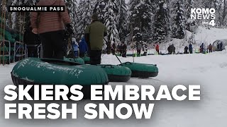 Skiers, snowboarders embrace fresh snow at Snoqualmie Pass